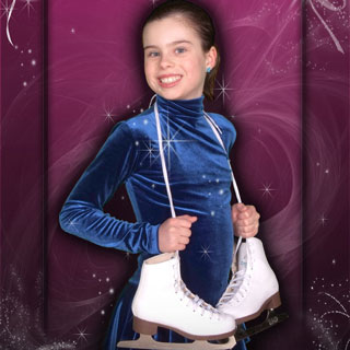 Young girl posing with ice-skates