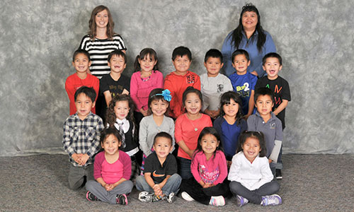 Class photo of students and teachers in group